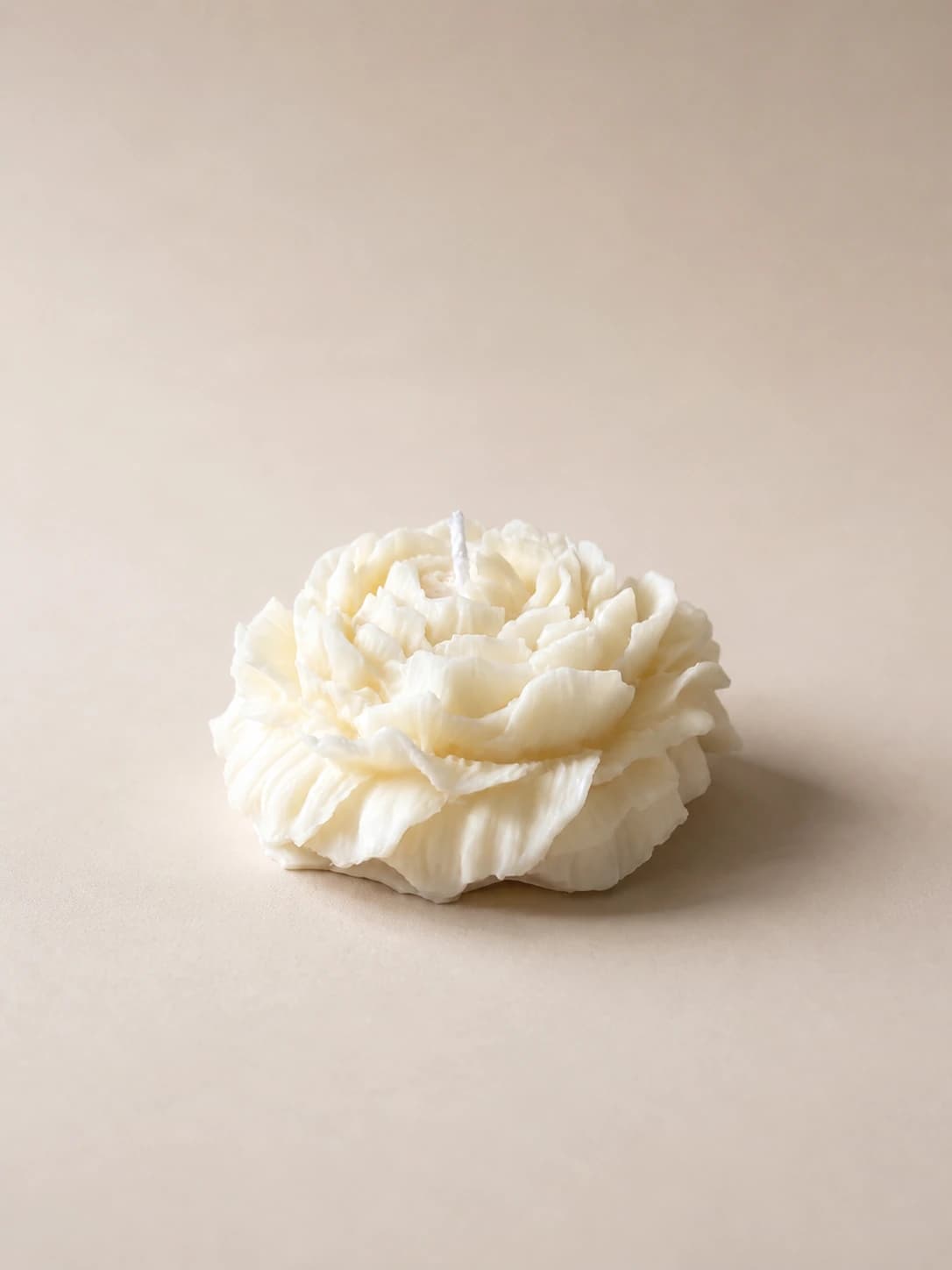 Peony Reverie sculptural candle arranged like a floral bouquet